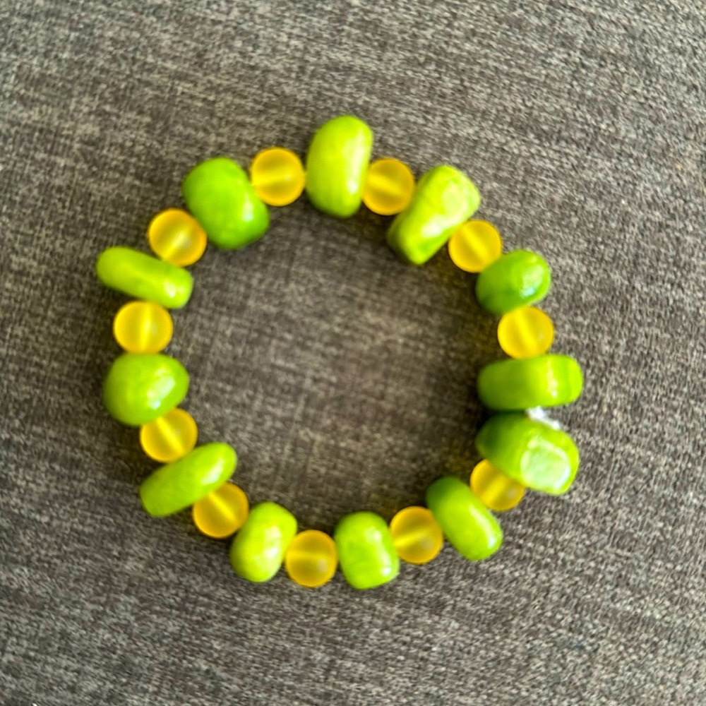 Handmade bracelet with yellow/green glass beads